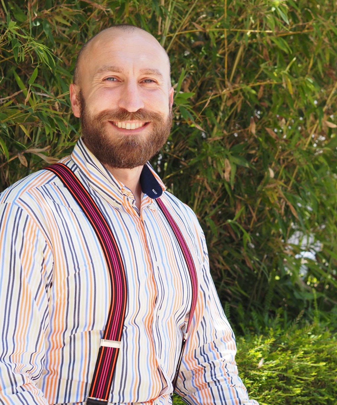 Michal Wojewodzki smiling outdoors